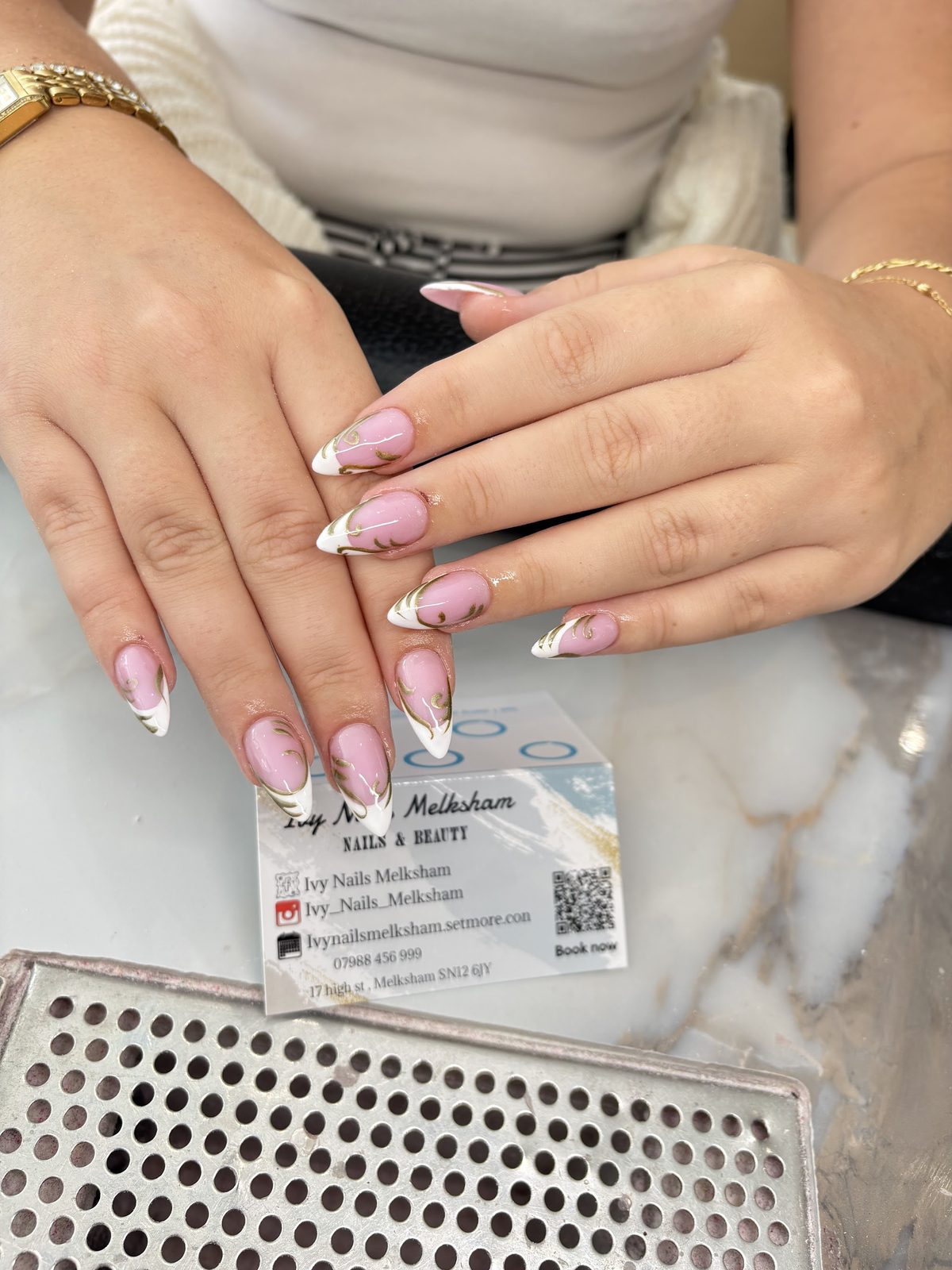 Pink almond French tips with gold and white detail