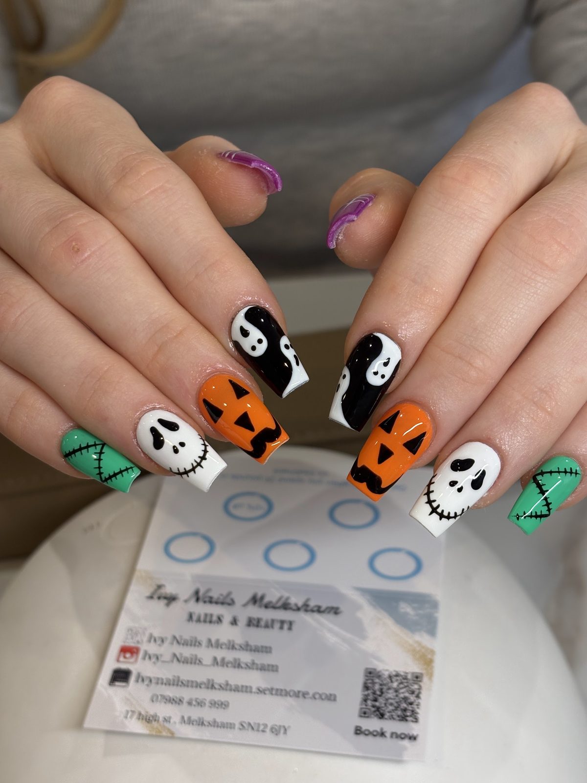Halloween square nails with pumpkins, ghosts and Frankenstein green