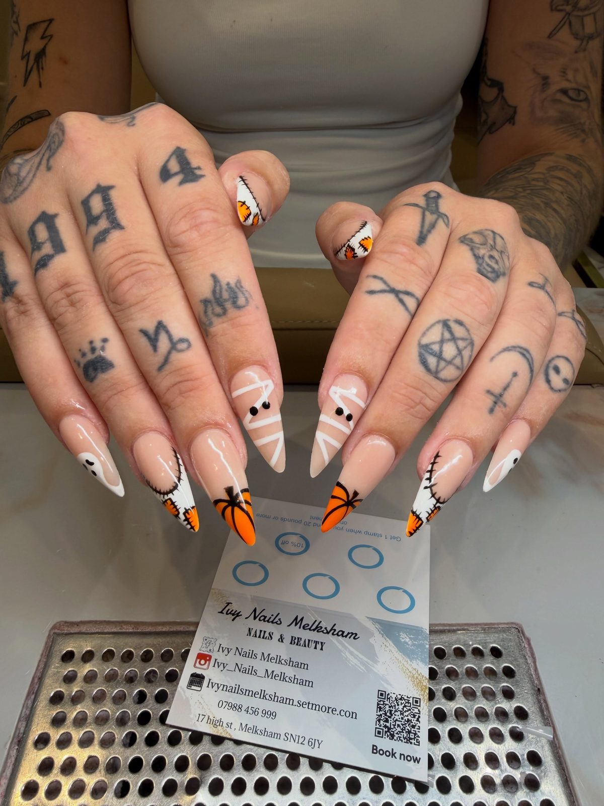 Almond nails with mummy and pumpkin tips